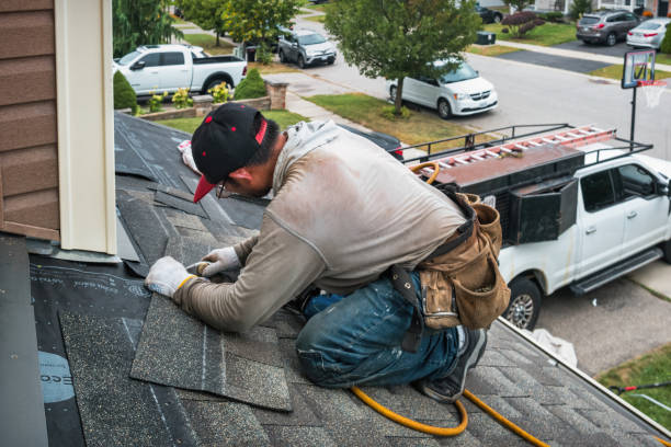 Professional Roofing technician working in Flint, MI